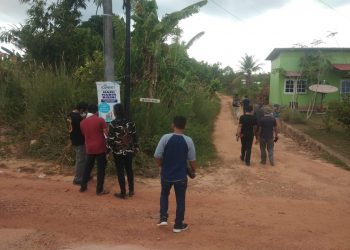 Satreskrim Tanjungpinang bersama tim Kuasa Hukum Sembiring, saat meninjau lokasi, f : Mael/detak.media