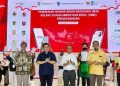 Kementerian Koperasi dan UKM menyerahkan 560 NIB kepada pelaku UMK di Surakarta, Jawa Tengah, Kamis (7/7/2022). ANTARA/HO-Kemenkop UKM
