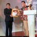 Bupati Natuna Wan Siswandi (kanan) saat menerima penghargaan kuategori The Best Regen Performance,