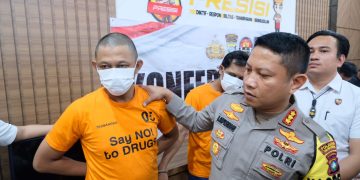 Tersangka Yudi saat Menjalani Konferensi Pers di Mapolresta Tanjungpinang, foto: Mael/detak.media