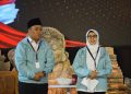 Paslon No. Urut 2 Rini Syarifah dan Abdul Ghoni saat mengikuti debat publik pertama calon Bupati Blitar 2024 digelar KPU, Jumat (18/10/2024).